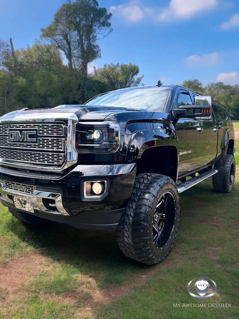 Black GMC Denali HD lifted